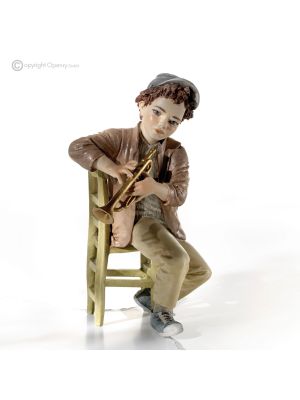 DAVIS - Italian craftsmanship, collectible dolls and trumpet musicians.