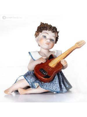 STELLA Porcelain figurine, musician with guitar, a refined touch.