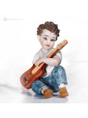 STEVE Musician with Capodimonte guitar, poetry in pure porcelain.