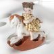 PONY MIGNON F - Timeless elegance for this handcrafted porcelain doll.